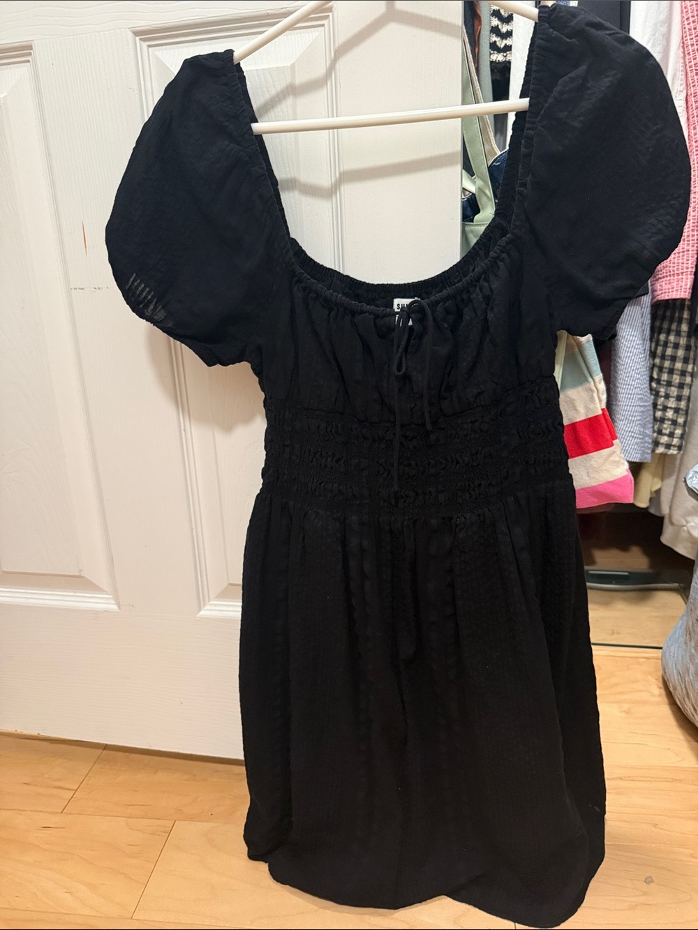 Aritzia Black Puff-Sleeve Smocked-Waist Mini Dress